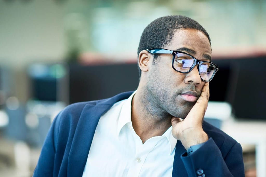 An employee looking disengaged at work