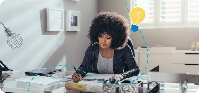 a woman at a desk connected to other people working from home