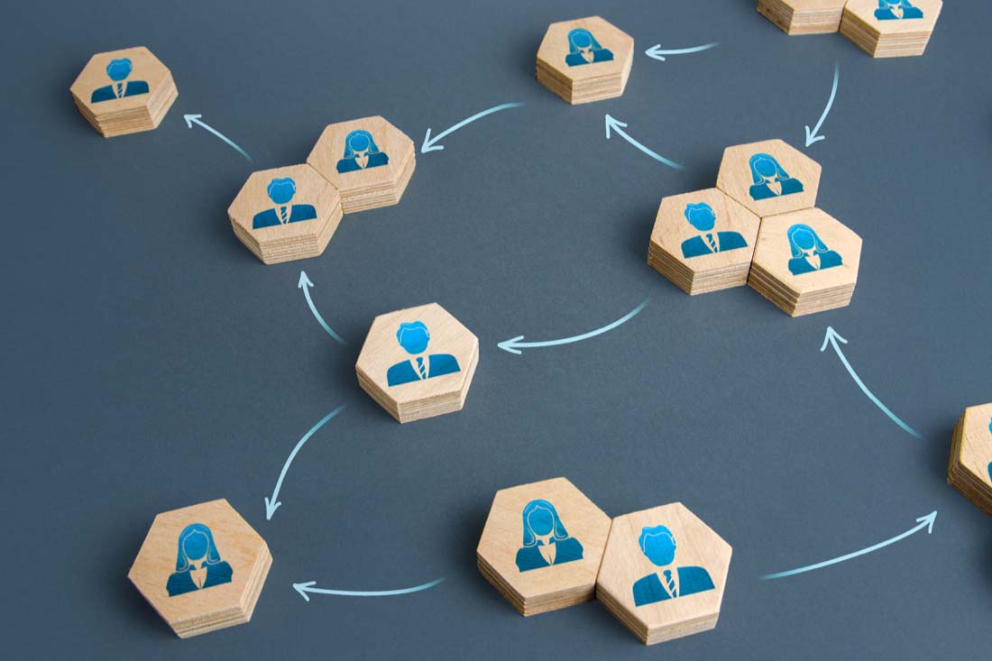 Groups of blocks that represent employees to symbolize effective work management.