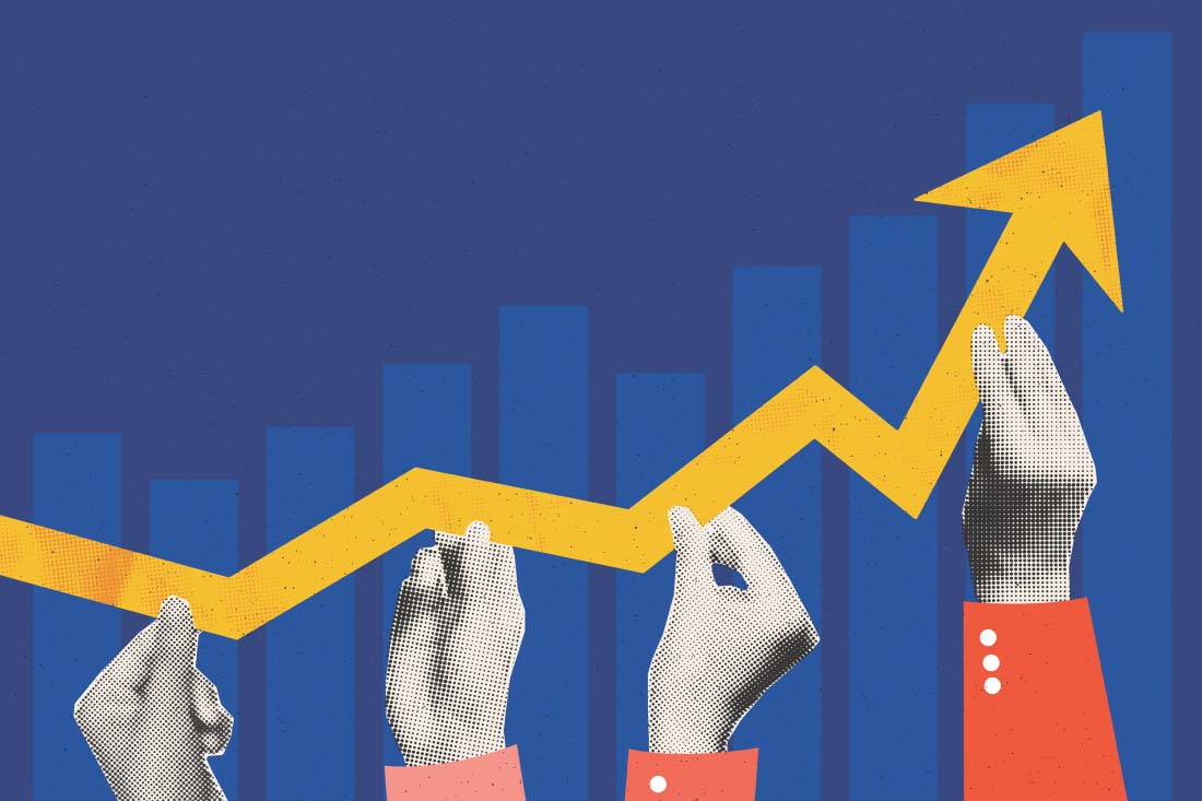 Hands holding a line graph up and to the right to signify collaboration and productivity.